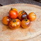 Tomatoes on a wooden cutting board